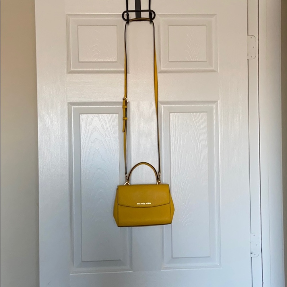 Michael Kora yellow crossbody purse